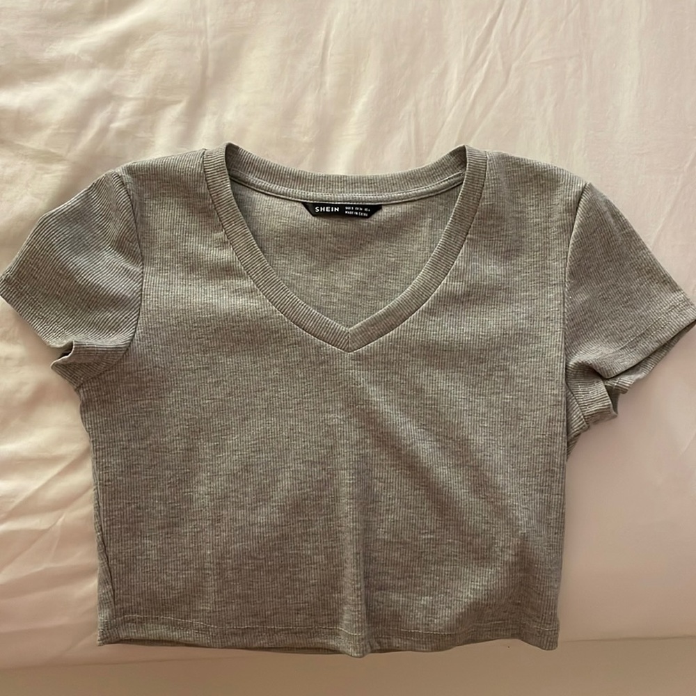 Small shirt. Never worn.